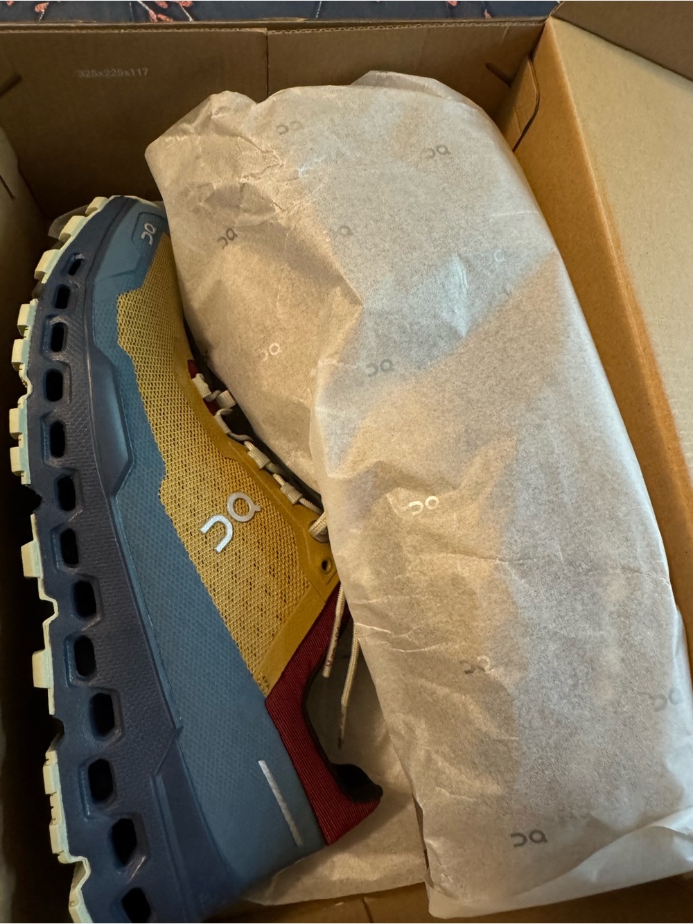 On Running Men’s Cloudventure Trail Shoe — Yellow, Blue, Red